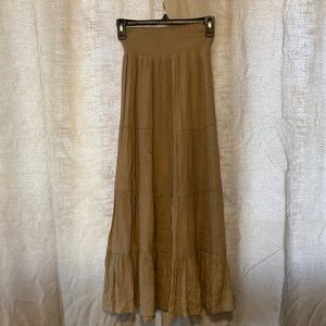 Long, tan Bohemian skirt. Lined with a stretch waist.